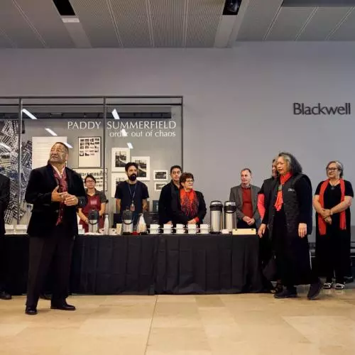 Members of the Māori community perform songs of appreciation during lunch at the Weston Library.  