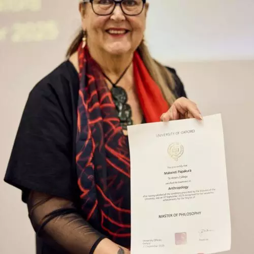 June Northcroft Grant holding Mākereti's degree certificate.