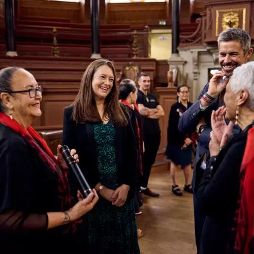 (Left) June Northcroft Grant speaks with other guests in the Sheldonian Theatre after the graduation ceremony. 