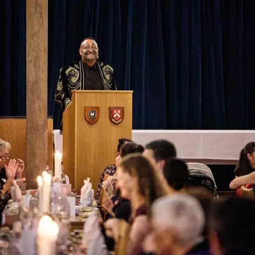 A representative of Māori community delivering a speech during the dinner at St Anne's College. 