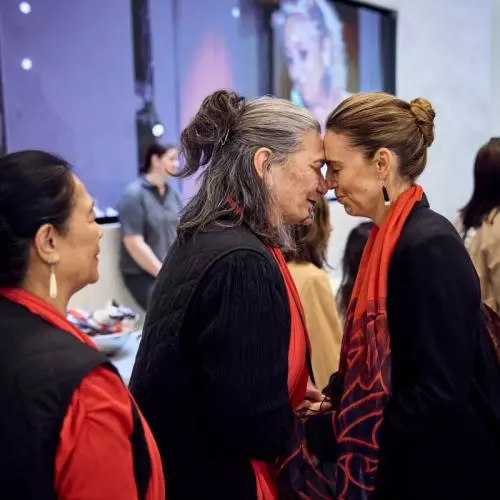 (Right) Dame Jacinda Ardern, former Prime Minister of New Zealand, greets guests from Aotearoa at the Weston Library with traditional Māori gestures. 