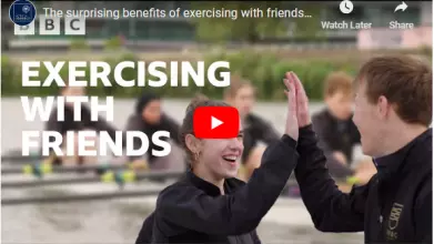 rowers high fiving - opening screen shot of the Exercising with Friends video