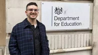 ibrahim ince, out side the department of education - smiling 