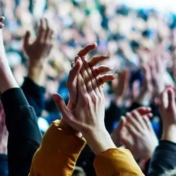 hands clapping - hands in crowd raised in applause