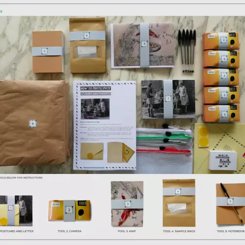 An image showing envelopes, notebooks cameras maps, a sample bag and packaging that makes up the tool kit