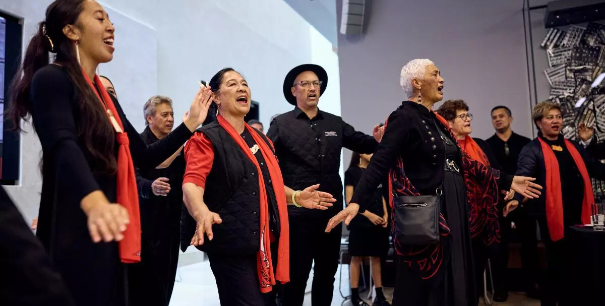 Members of the Māori community perform songs of appreciation during lunch at the Weston Library.